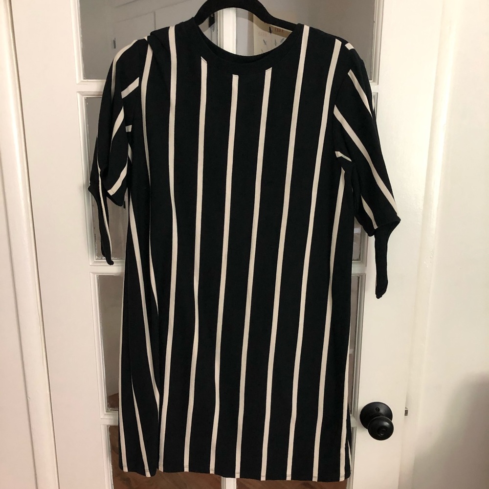 Black tee shirt dress with ties on sleeves